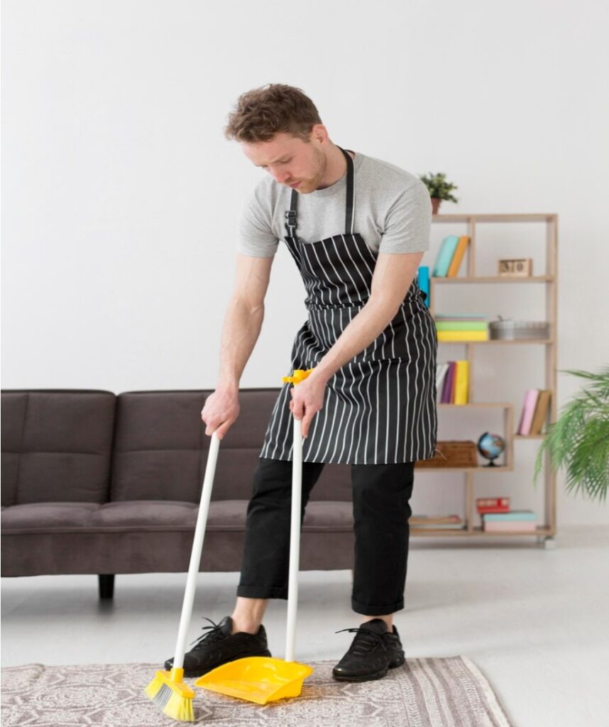 A man cleaning floors
